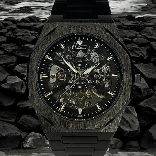 montre acier noir skeleton